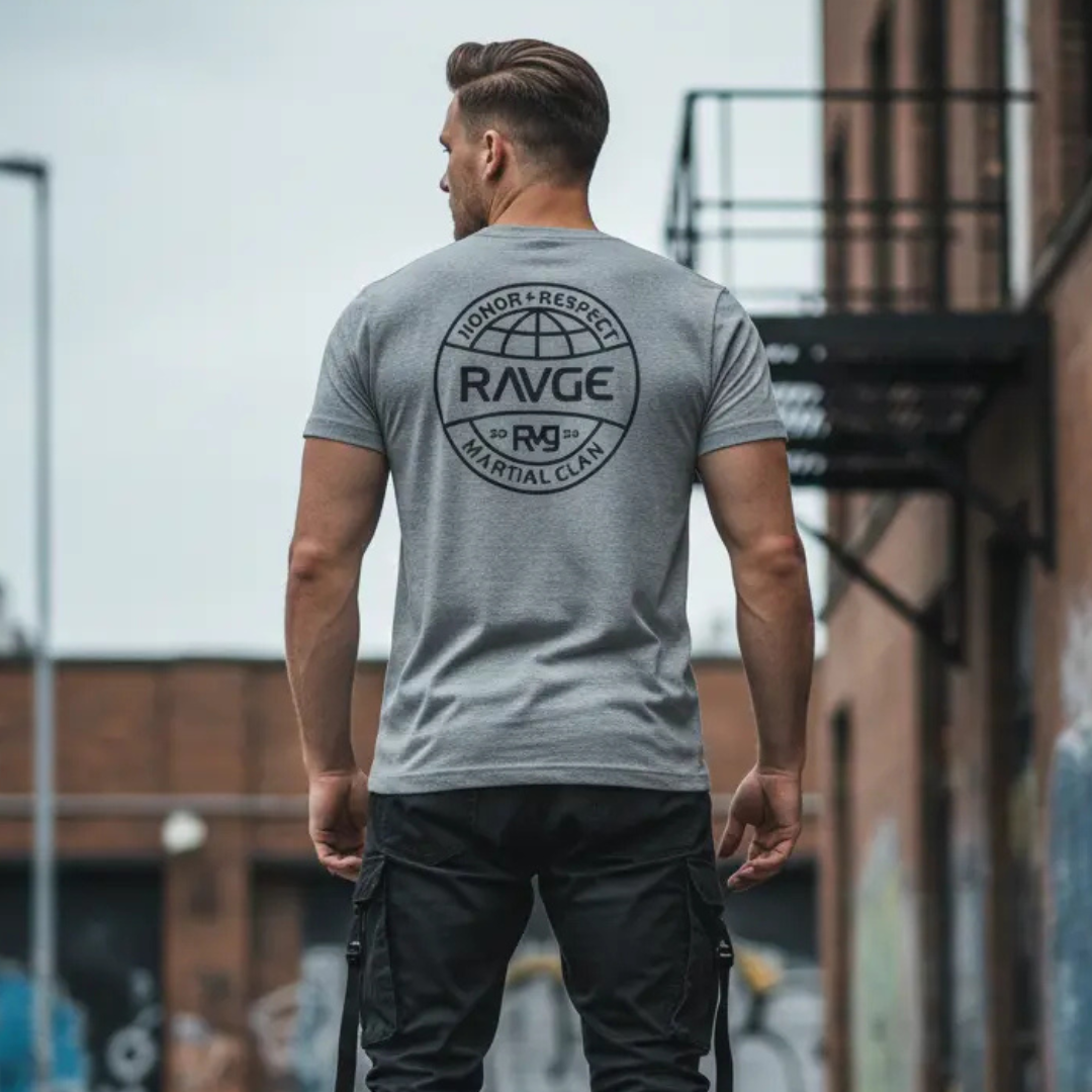 Playera RAVGE Honor color gris jaspe con grafico en espalda y logo RVG, disenada para uso urbano y entrenamiento.