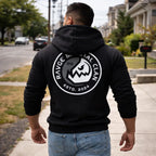 Sudadera negra RAVGE Martial Clan con grafico en espalda y logotipo RVG, disenada para uso urbano y estilo deportivo.